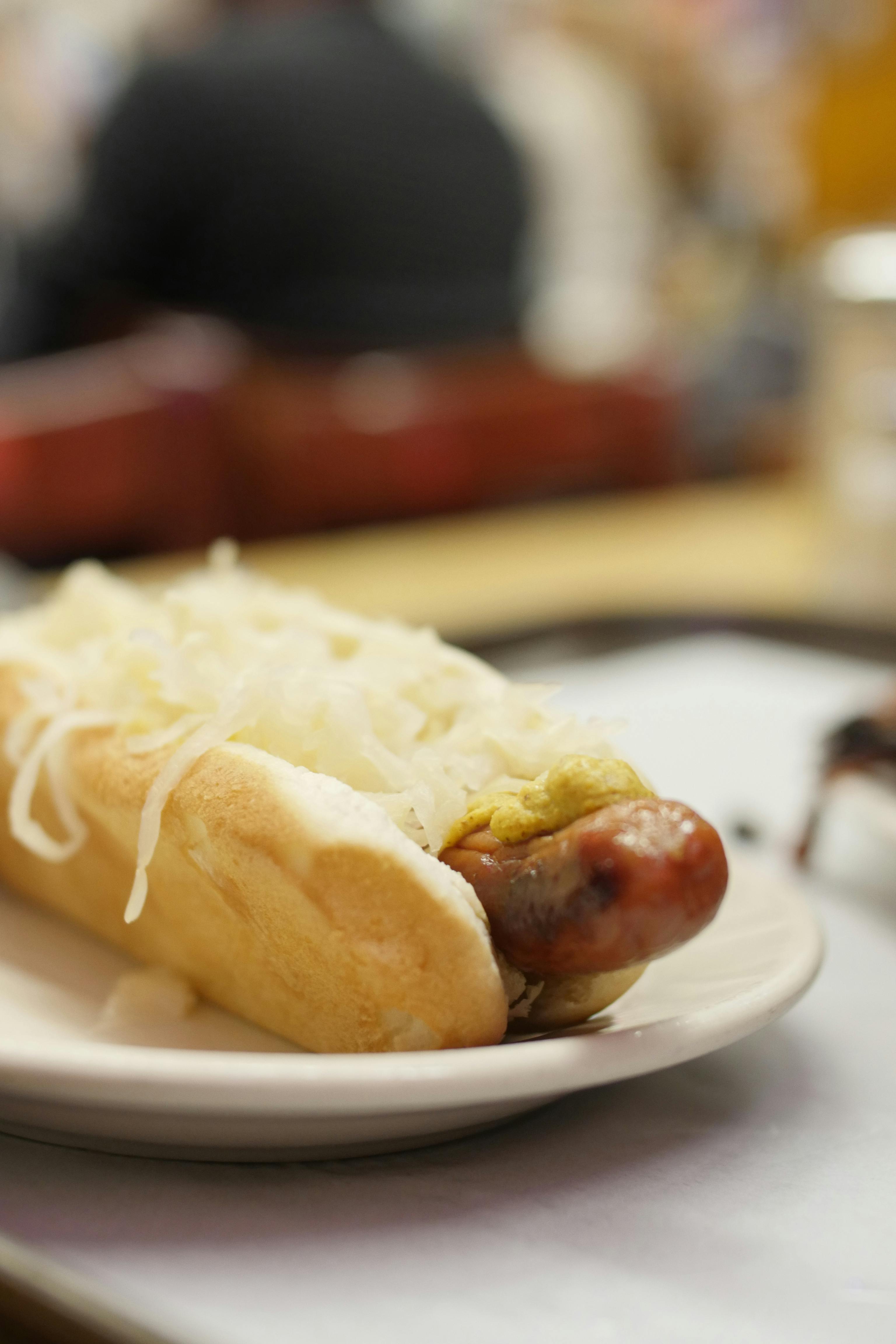 Footlong Hotdog and Fried Onions in a Soft Roll