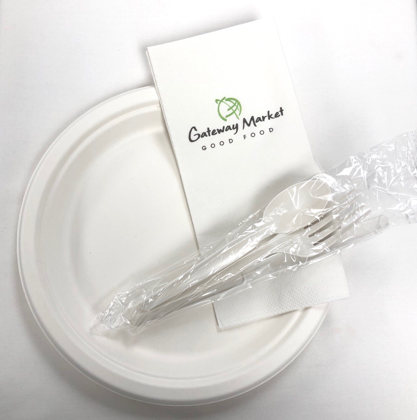 Compostable 9 inch plate, Packet of Compostable Utensils and GWM Dinner Napkins